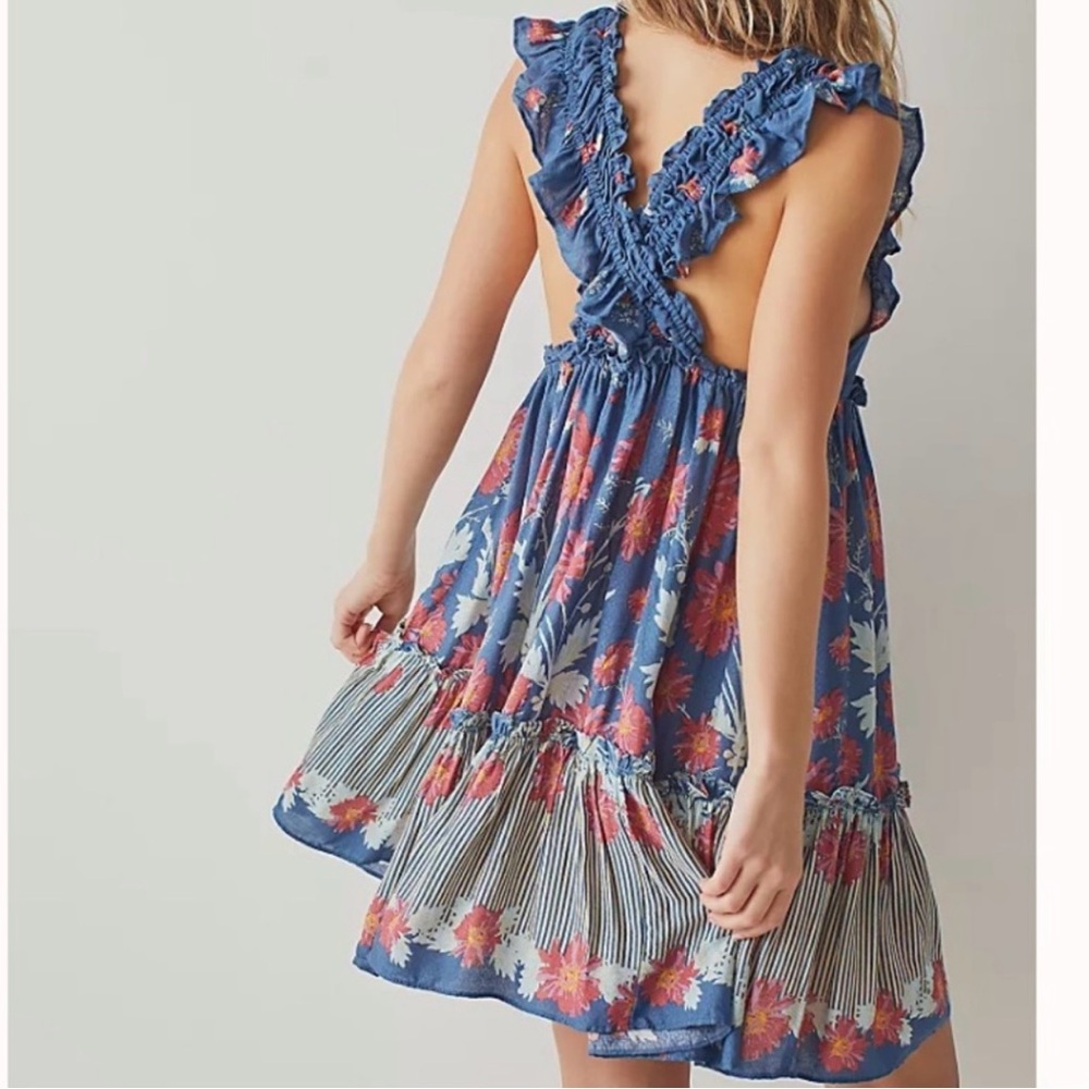 FREE PEOPLE Bali Wild Daisy Slip /
Stellar Combo size Medium - Picture 14 of 14